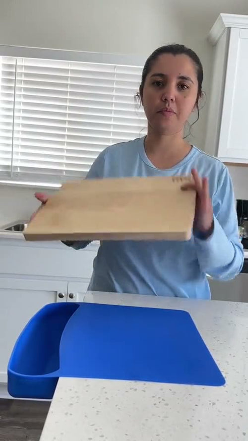 Home cook setting the fitted board onto the ROO mat