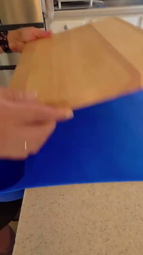 Home cook setting up the ROO mat for family dinner prep